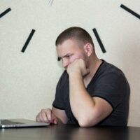 Unemployed person looking for a job on the internet Unemployed person looking for a job on the internet